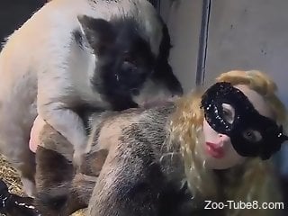 Masked blonde allows a sexy pig to pound her silly